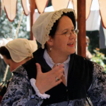 Side view of Trystan in a wired cap at Much Ado About Sebastapol faire 2011, photo by Claudia Laughter