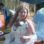 Titania hands out roses, photo by Kim Knight Dirato